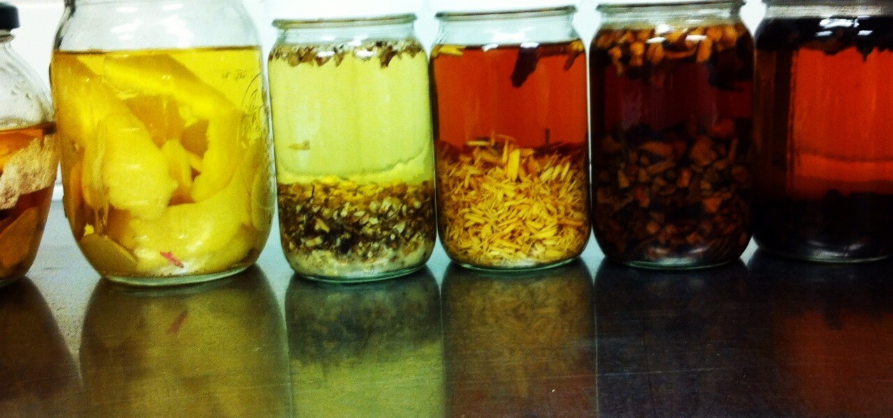 Multiple jars of different infusions.
