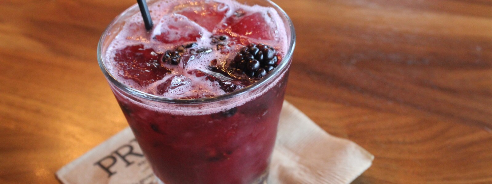 Blackberry cobbler cocktail in a rocks glass.