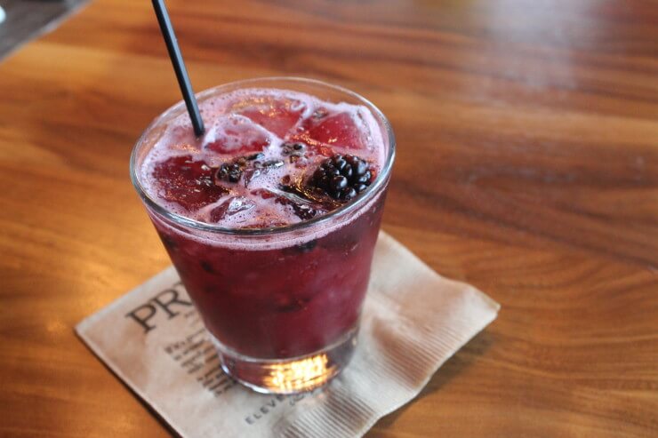 Blackberry cobbler in a rocks glass.
