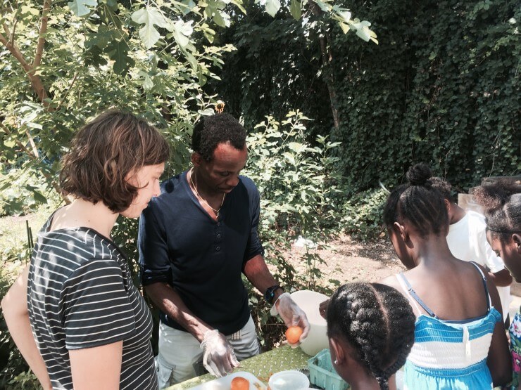 Chef Danval showing students meal preparation.