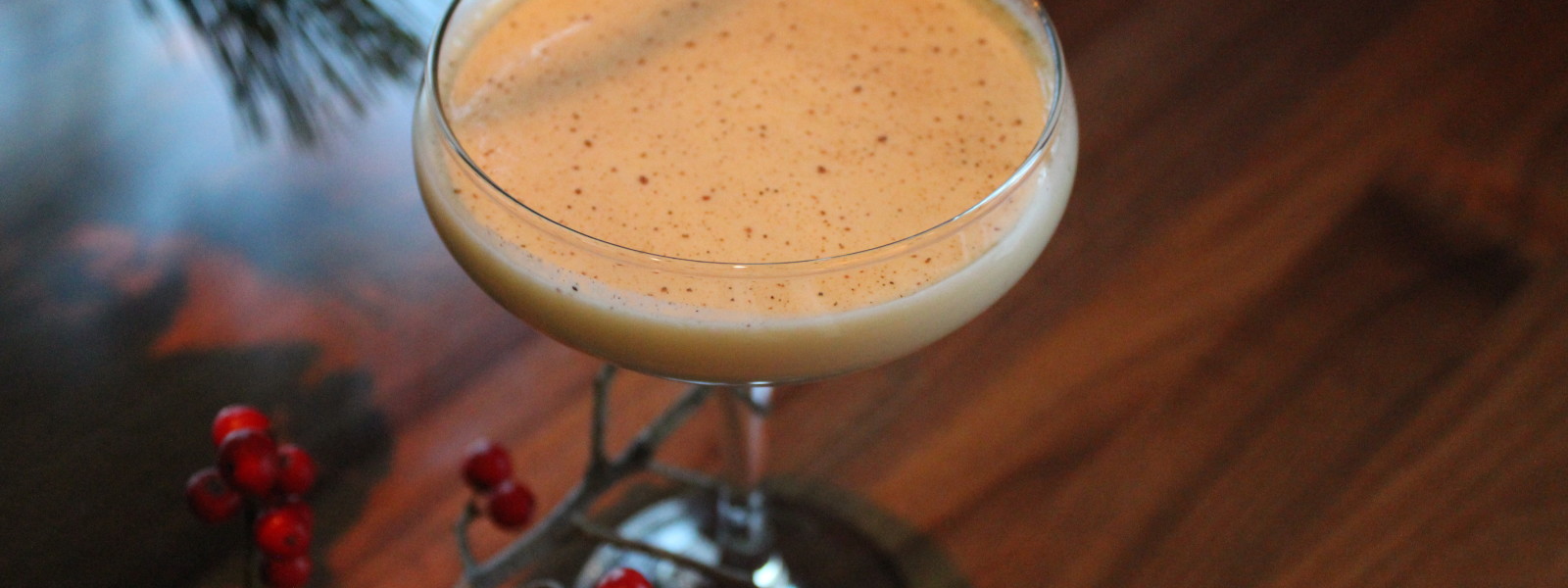 Egg Nog and Coquito in a coupe glass.