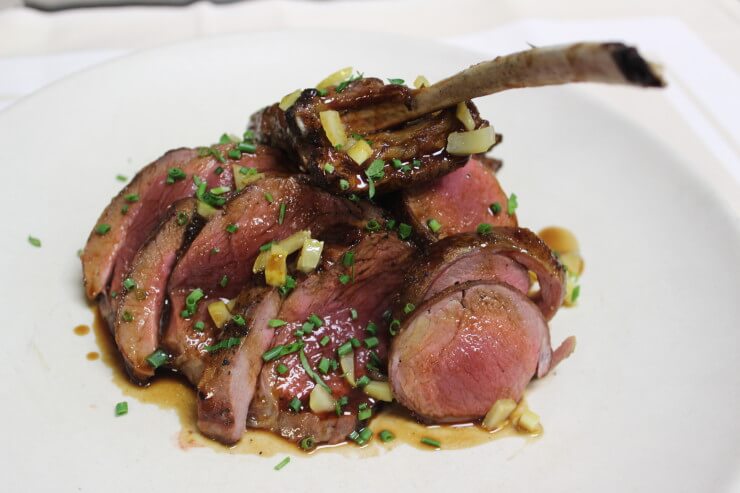Mixed grilled spring lamb with rosemary fingerling potatoes, preserved lemons, swiss chard, au jus.
