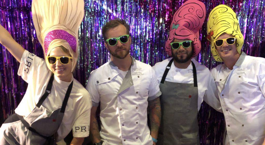 Forager Meghan Boledovich, Chef Gary King, and 2 others in sunglasses and hats for Drag Brunch.