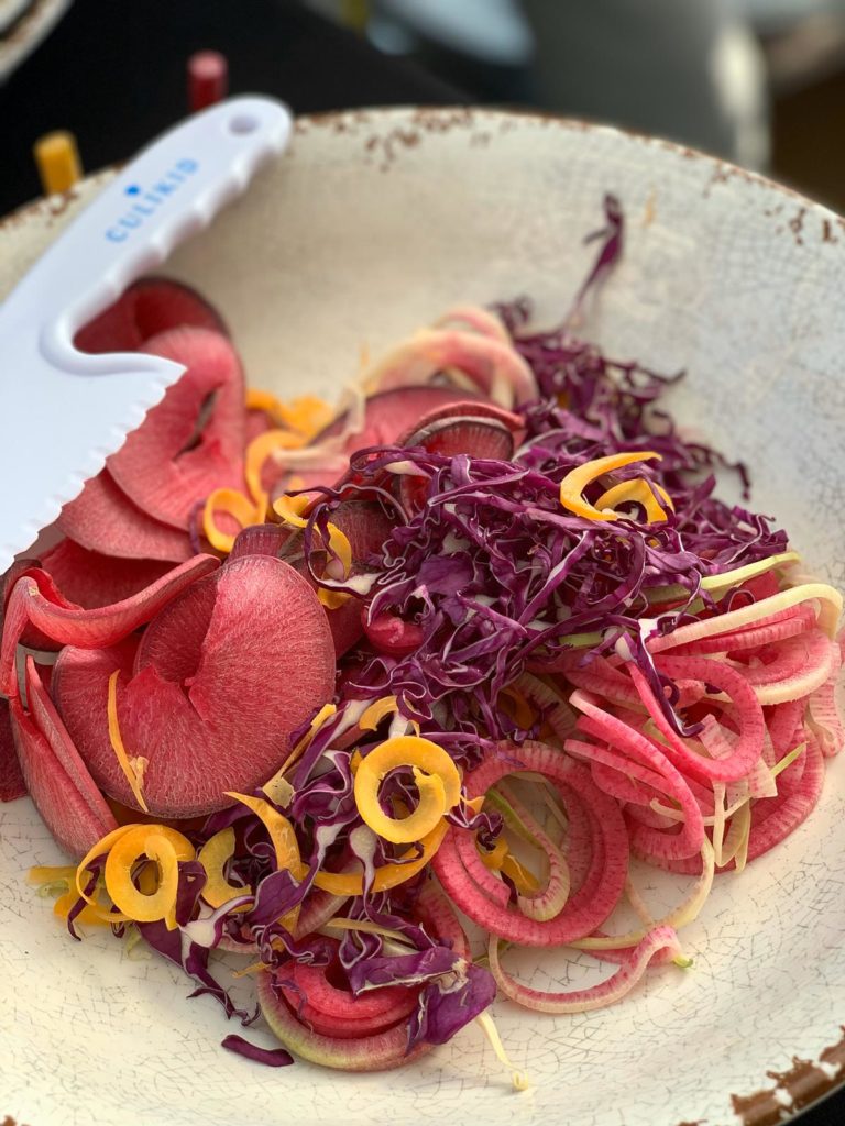 Culikid fall rainbow crunch salad with colorful spiralized vegetables.